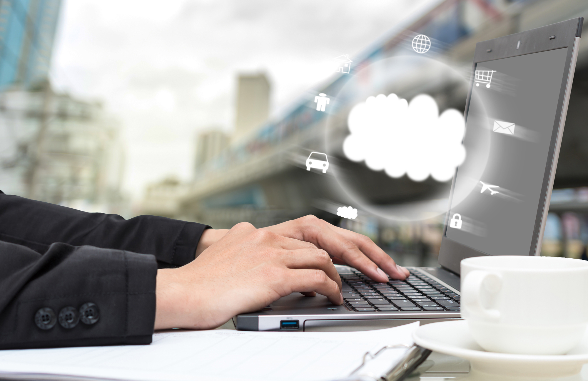Businessman Hand pressing the keyboard for manage the Cloud Comp