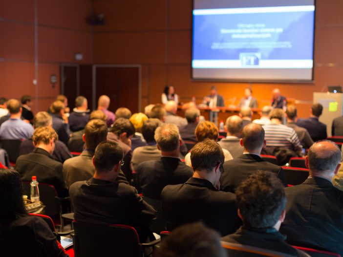 Audience in conference room