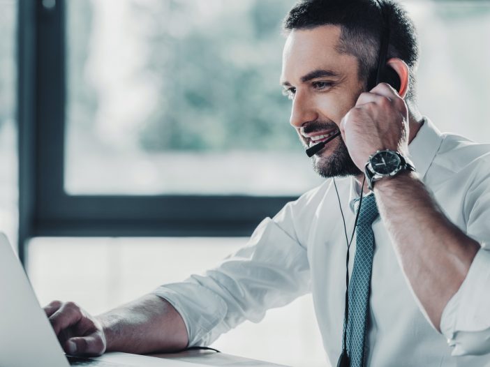 Man using Microsoft Teams as a business communication and collaboration tool.