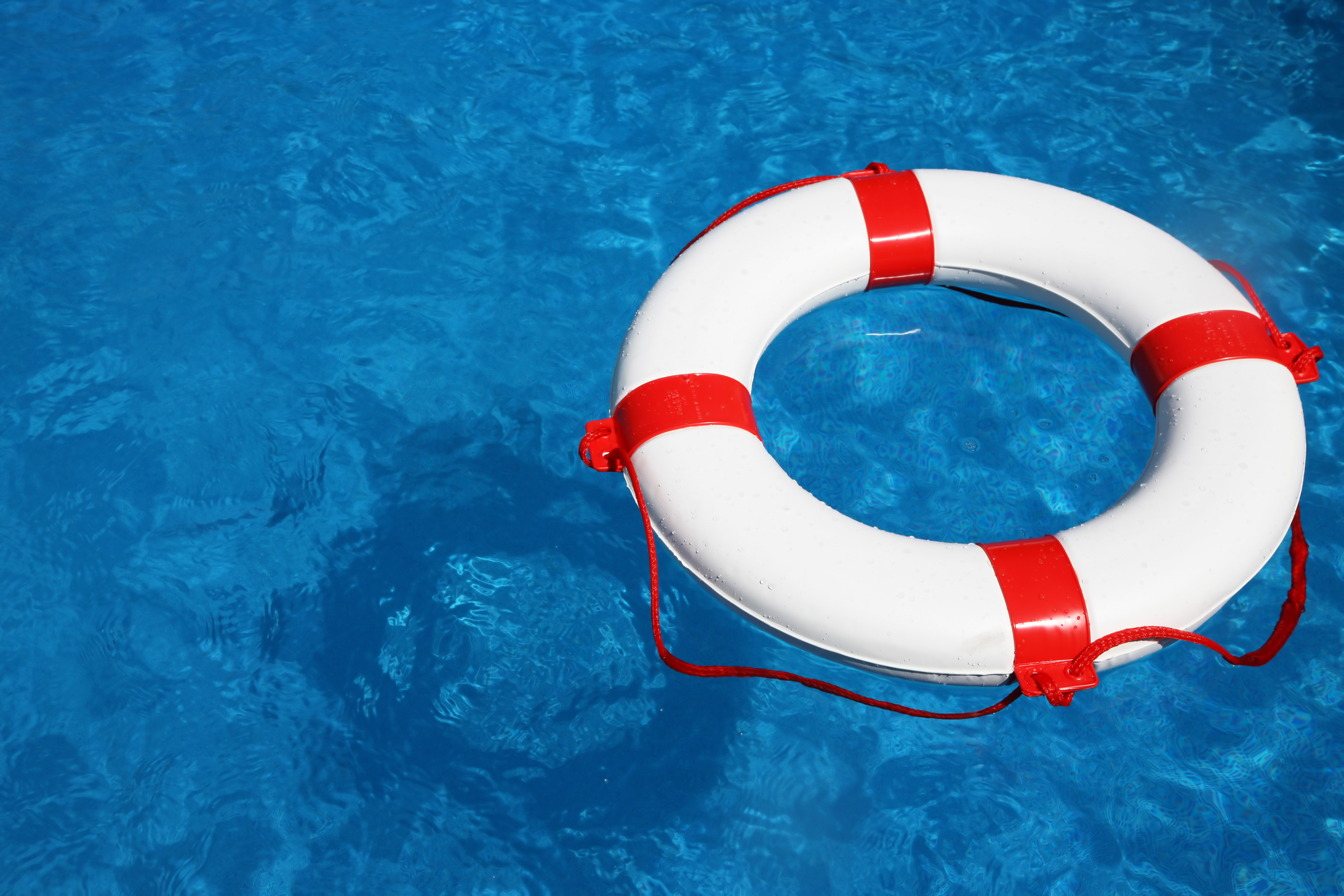 pool and a Life Preserver