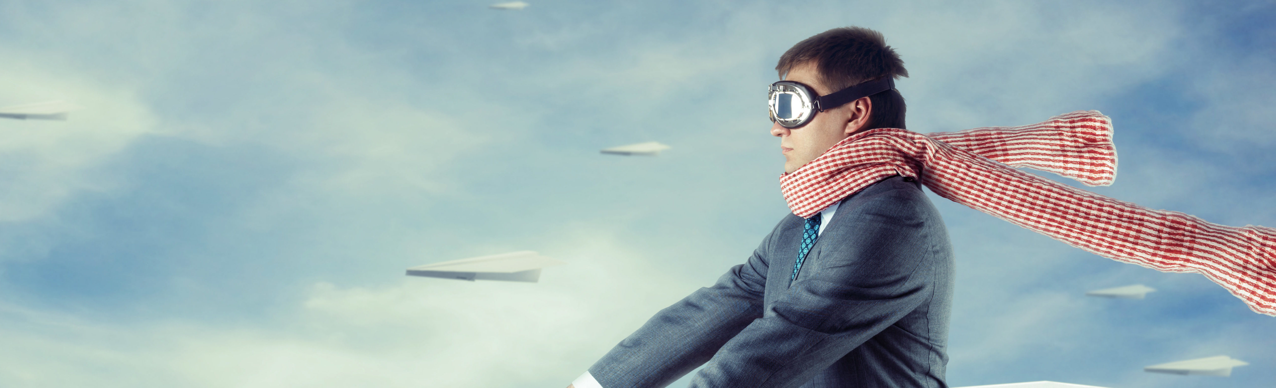 Man flying on a paper airplane through the cloud, IT support is easy and affordable concept